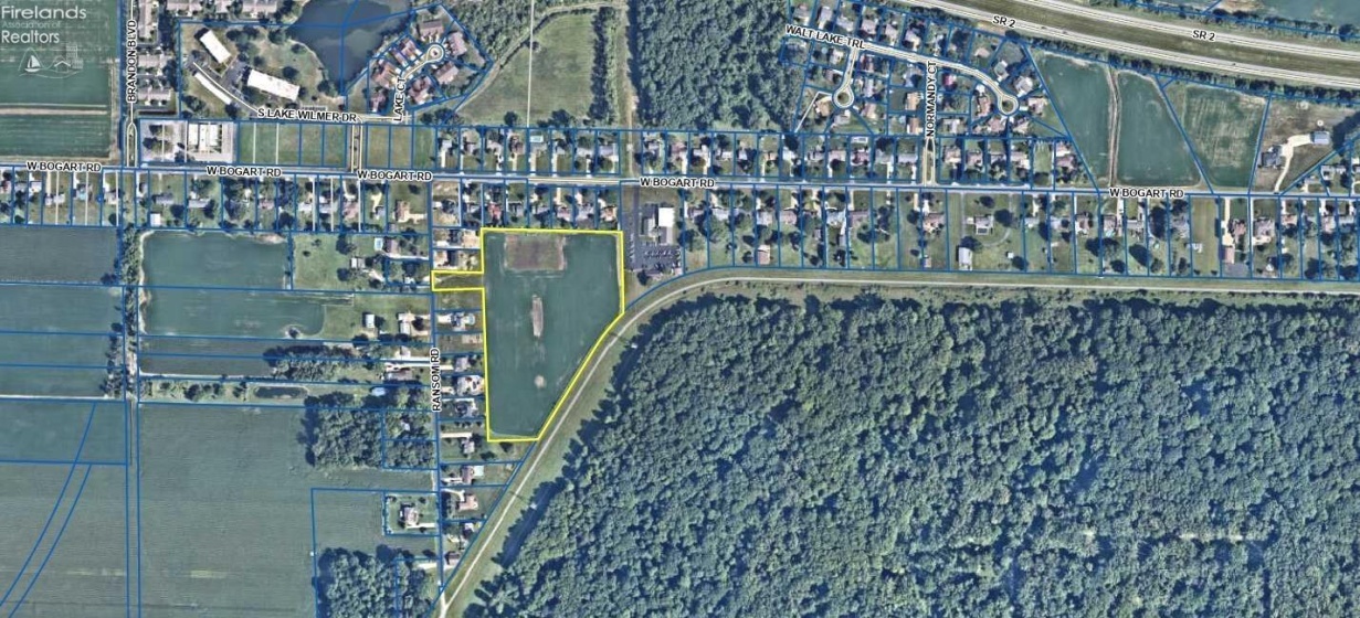 Aerial view of the 10.56 acres in yellow.