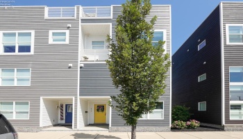 Yellow door is the main entrance of the condo.