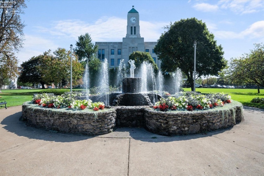 Boy in the boot fountain in Washington Park is within walking distance.