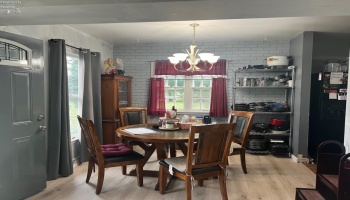 New lux vinyl plank flooring has been installed. Next owner will have the remainder of the flooring left to finish the kitchen area.