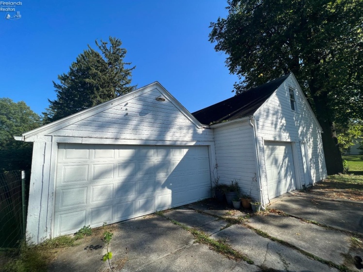 3 car garage with space for hobby toys or workshop area. Including a loft area for storage