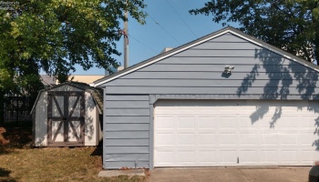 Very large garage with electric opener and new wiring to the outlets.