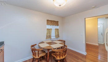 Kitchen with dinette area.  hardwood flooring