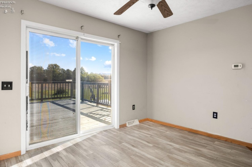 Dining Area with Glass Doors to Deck