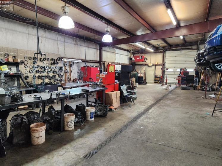 Inside the newer metal building.