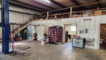 Inside the newer metal building, 2nd floor loft area for storage. Inside the newer metal building, 2nd floor loft area for storage.