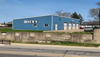The metal building is newer. The metal building is newer.