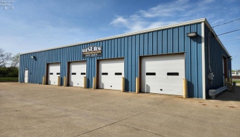 Newer metal building w/5 over head doors, these 4 doors are 10 ft high, the side door is 12 ft high. Newer metal building w/5 over head doors, these 4 doors are 10 ft high, the side door is 12 ft high.