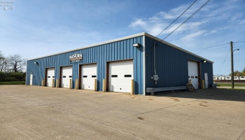 Newer metal building w/5 over head doors, these 4 doors are 10 ft high, the side door is 12 ft high. Newer metal building w/5 over head doors, these 4 doors are 10 ft high, the side door is 12 ft high.
