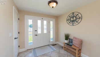 Main foyer with two separate interior entrance's for main house and guest suite.