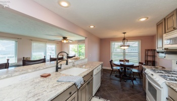 Guest suite kitchen - beautiful inside and out with spectacular water views.