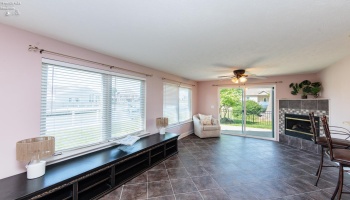 Living room of guest suite with fireplace and open concept- beautiful water views.