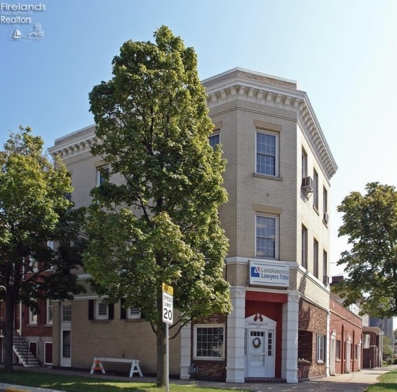 Front of building at the corner of Columbus Avenue and Adams Street
