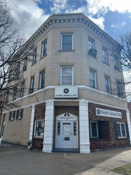 Front of building at the corner of Columbus Avenue and Adams Street