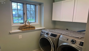 Convenient first floor laundry. (Appliances stay) Convenient first floor laundry. (Appliances stay)
