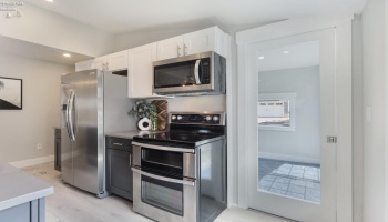 Kitchen with Pocket Door to Sunroom Kitchen with Pocket Door to Sunroom