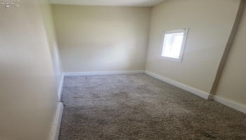 Small room for office, playroom or storage off of the living room. Small room for office, playroom or storage off of the living room.