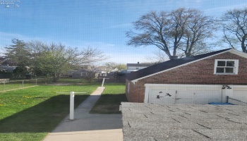 View of the back yard from upstairs. View of the back yard from upstairs.
