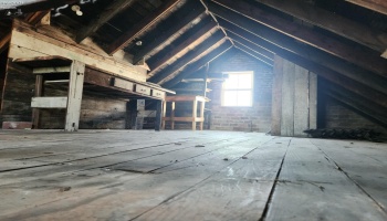 Garage attic space with stairs. Garage attic space with stairs.