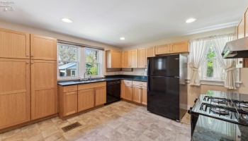 Completely renovated kitchen with pantry and soft-closing drawers and cabinets