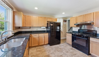 Completely renovated kitchen with pantry and soft-closing drawers and cabinets