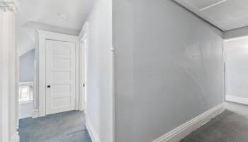 Upstairs hallway with access to four bedrooms, front and bath staircases and full bath