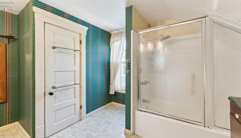 Spacious full bath with separate dressing area and walk-in closet with window!