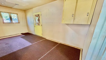 Laundry area on way to attached garage