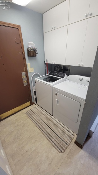 Laundry on Main floor just inside garage.
