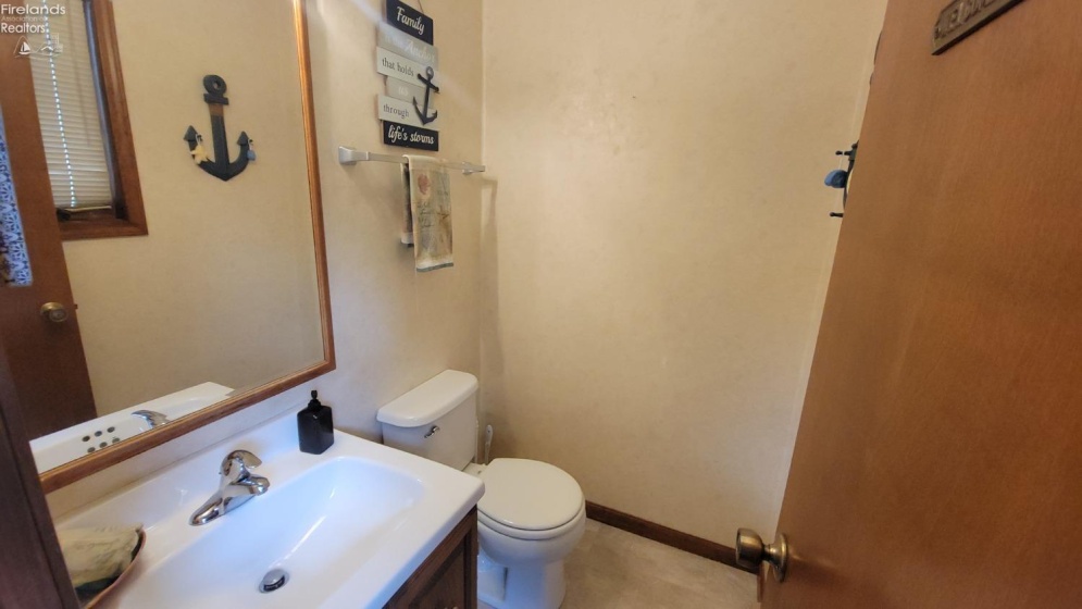 Half Bath off back of the home