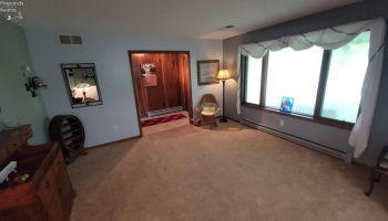 Living room and front door access