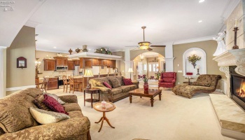 Great room looking into the Kitchen and front foyer