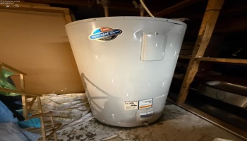 Water Heater located in basement - age unknown