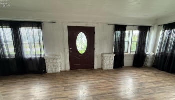 Enclosed porch-front entry