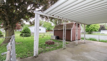 Covered patio - perfect spot for entertaining and hosting parties - attached to the garage too!