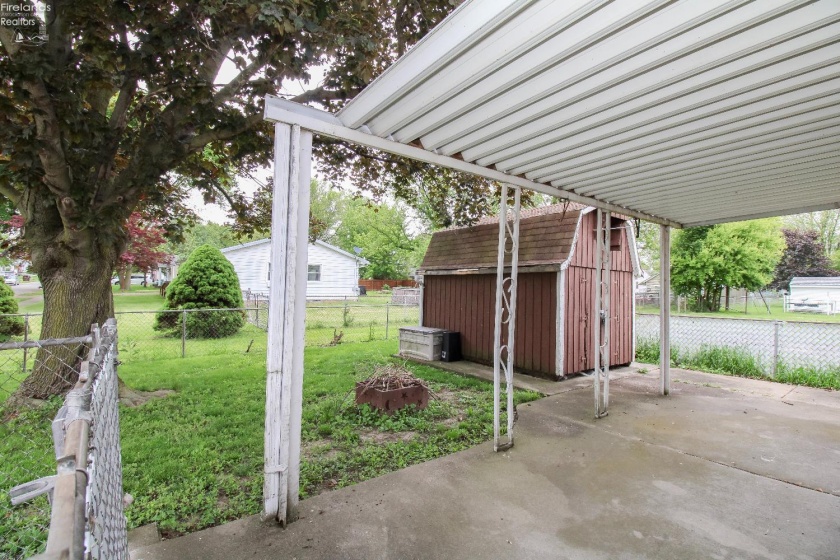 Covered patio - perfect spot for entertaining and hosting parties - attached to the garage too!