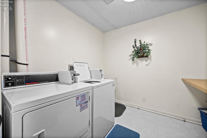 Laundry area 2 doors down from unit