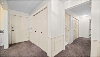 Unit Front door/foyer and hallway to Bedrooms