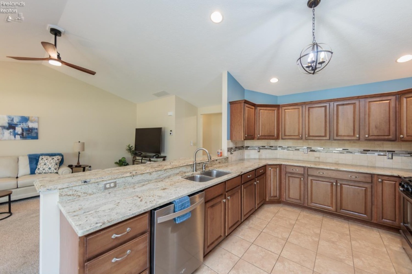 Kitchen open to living room for convenient entertaining.