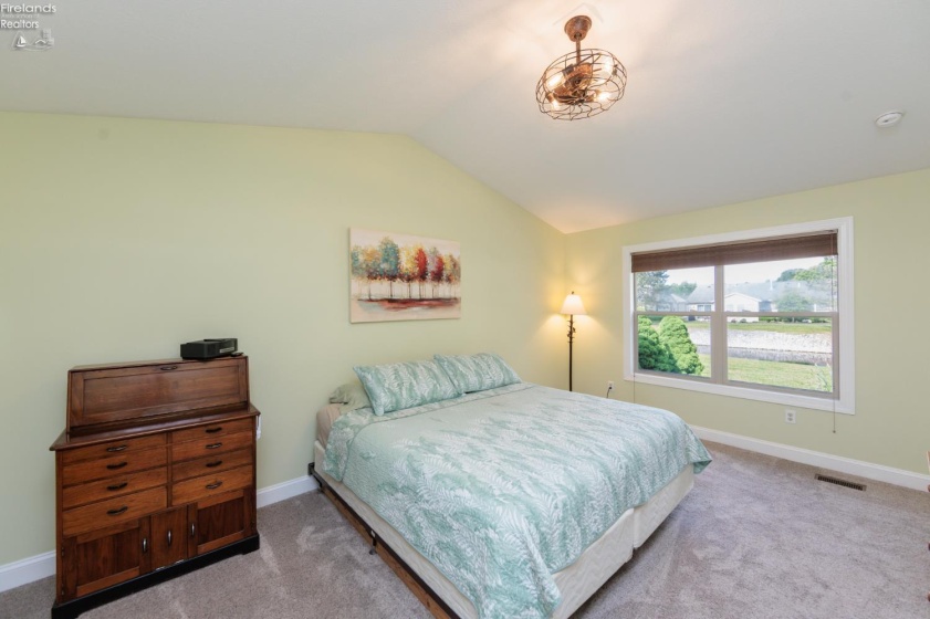Master bedroom with pond view.