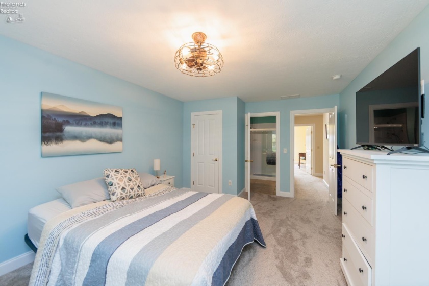Bedroom 3 with door leading to full bathroom that can be shared with second bedroom or be it's own suite.