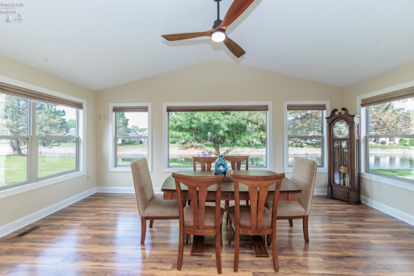 Year round sunroom (currently used for formal dining) with a great water view of the pond.