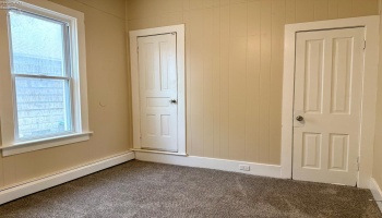 Bedroom 2 with access to walk-up attic