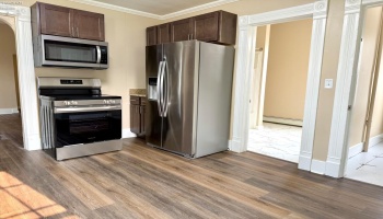 Renovated kitchen with stainless appliances