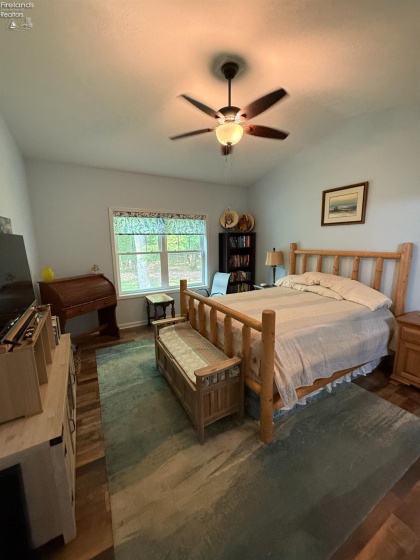 The Owner\'s Bedroom has a vaulted ceiling and overlooks the MetroPark.