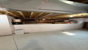 Large elevated crawl space.  Plenty of storage.