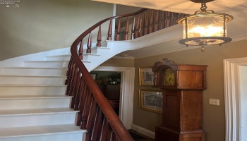 Beautiful stairway in foyer.