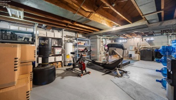 The house basement with Furnace and Hot Water Tank