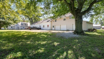 Additional 3-car garage on West end with plenty of parking and 625 square feet of partially finished storage area above.