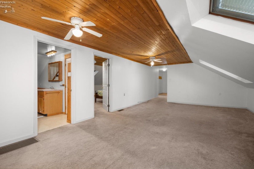 Family room looking towards bathroom, bedroom and entrance
